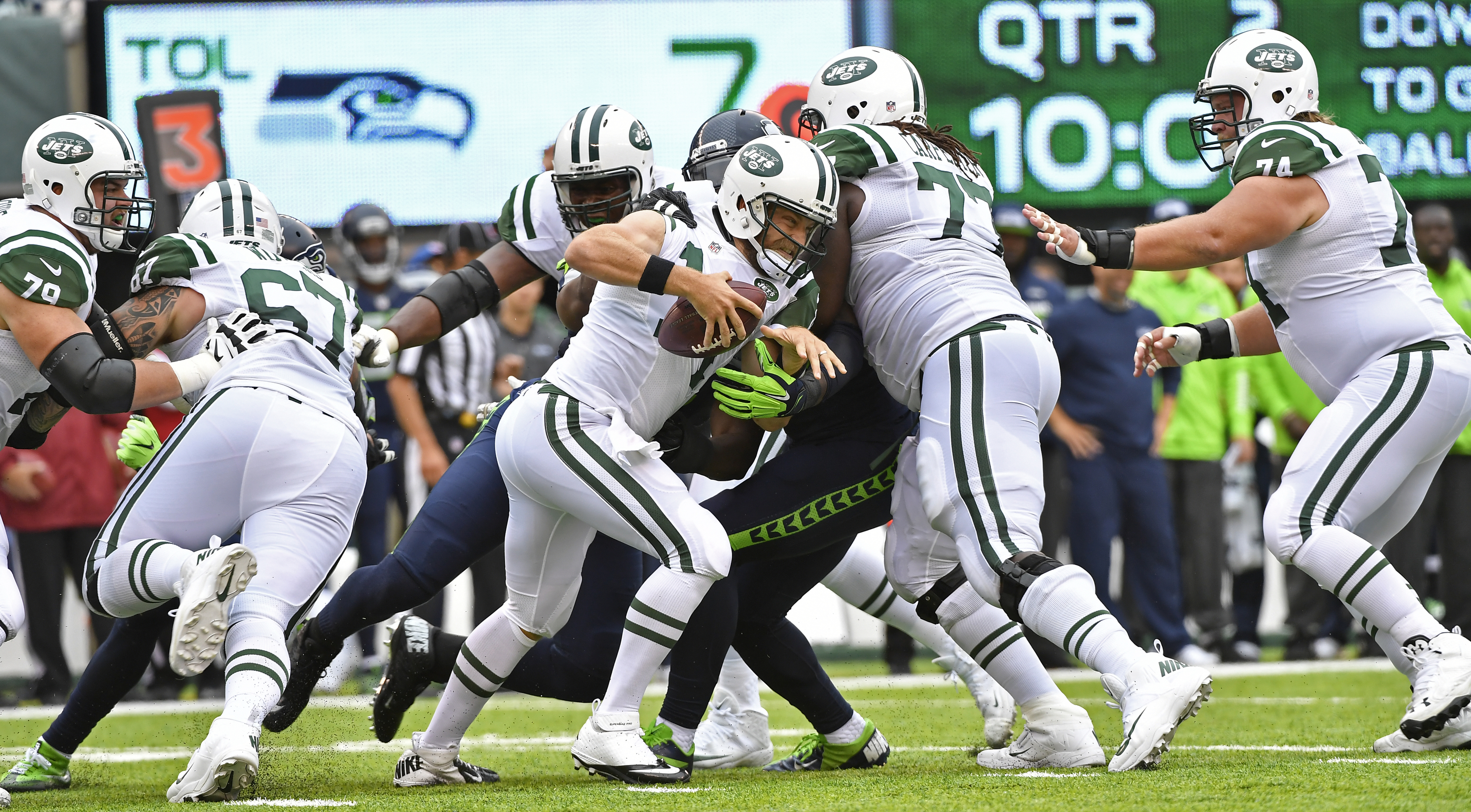 East Rutherford, N.J. - Sunday, October 2, 2016.  Ryan Fitzpatrick scrambles away from a possible sack.  New York Jets vs. Seattle Seahawks at MetLife Stadium.                (NY Sports Day/David L. Pokress)